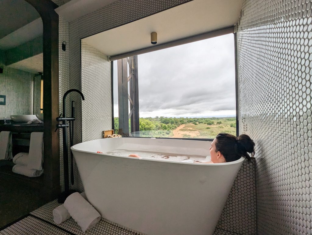 Person in bath at Kruger Shalati Train on Bridge