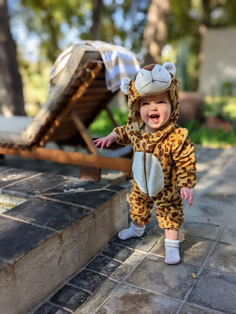 Toddler in leopard costume on safari